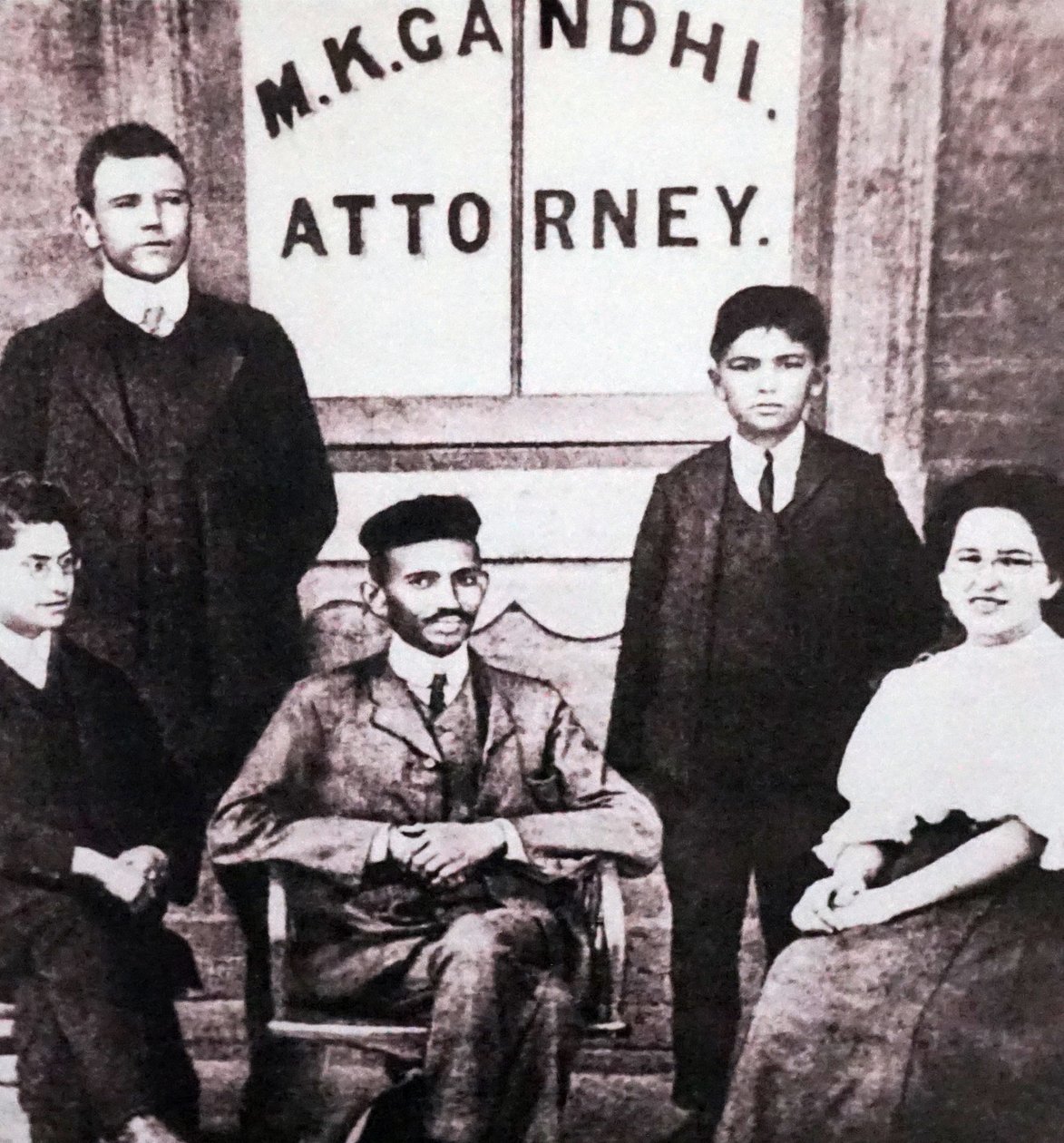Mahatma Gandhi Sitting with Four Associates in Front of His Attorney Legal Practice Office at Johannesburg, South Africa by Unknown photographer