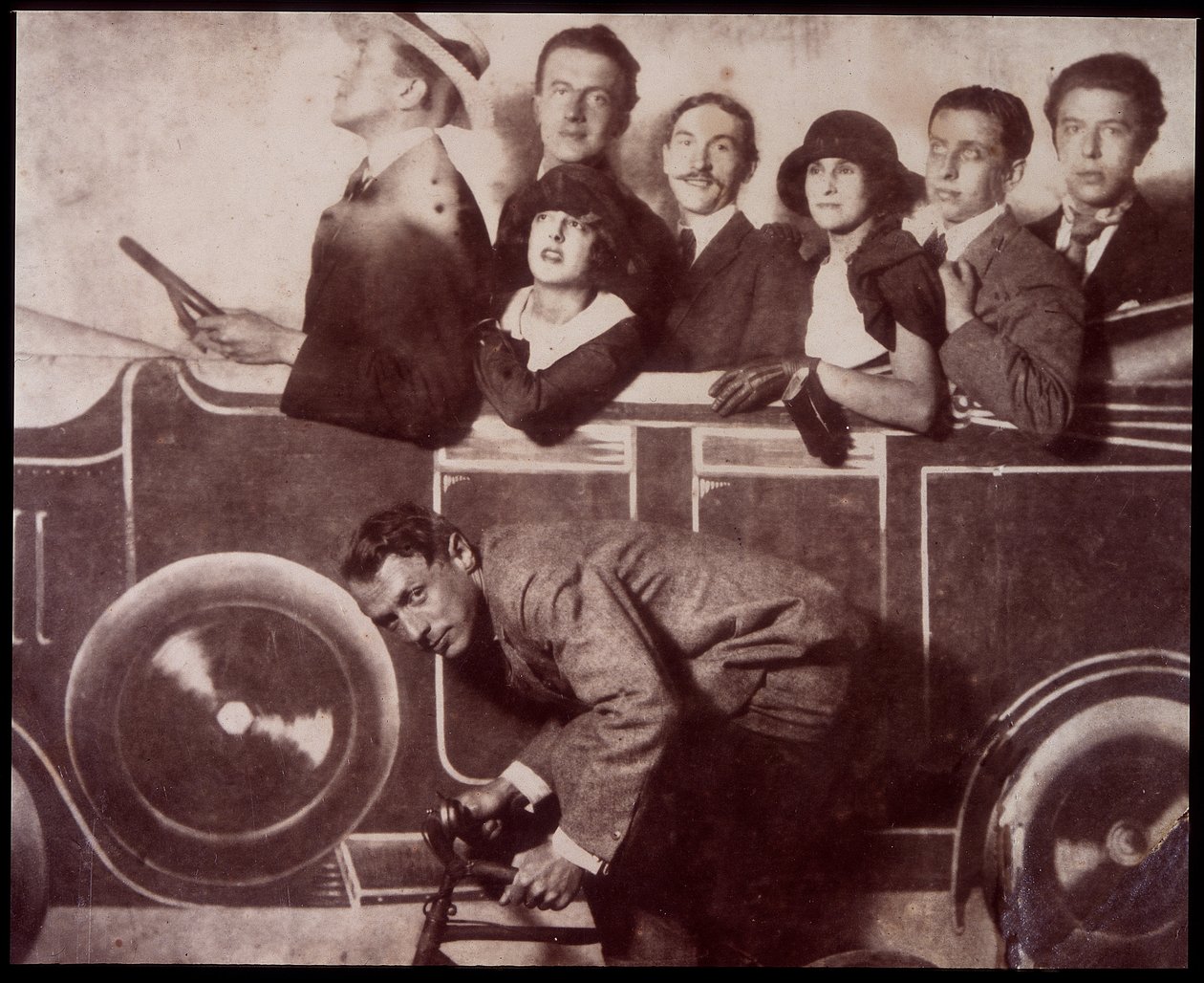Max Morise, Simone Breton, Paul Eluard, Joseph Delteil, Gala Desnos, Andre Breton, and Max Ernst at the Foire de Montmartre by Unknown photographer