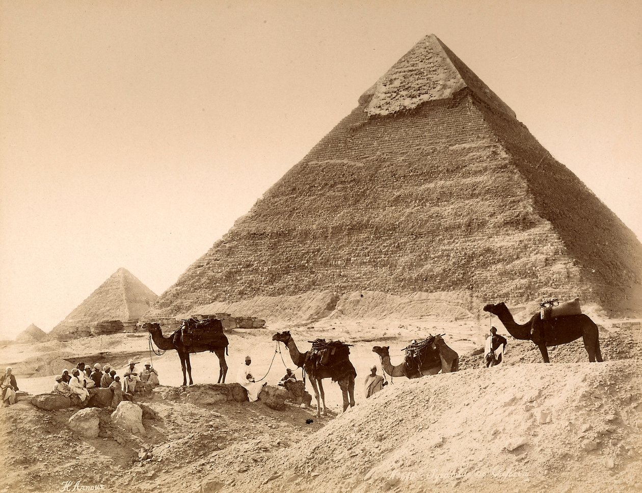 Men and camels in front of the pyramid of Chefren by Unknown photographer