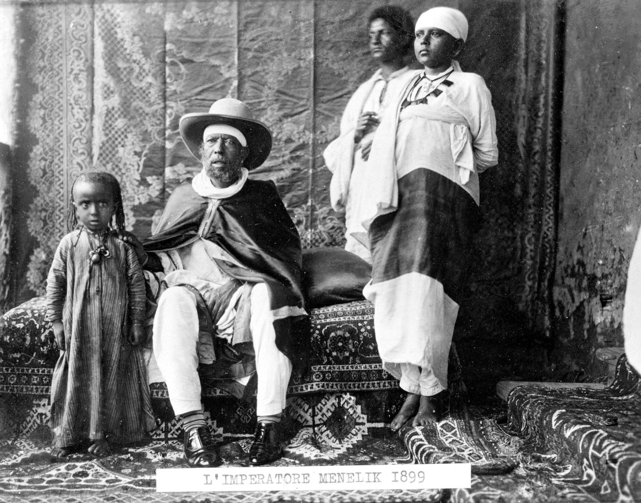 Portrait of Emperor Menelik II of Ethiopia (1844 - 1913) with his family. by Unknown photographer