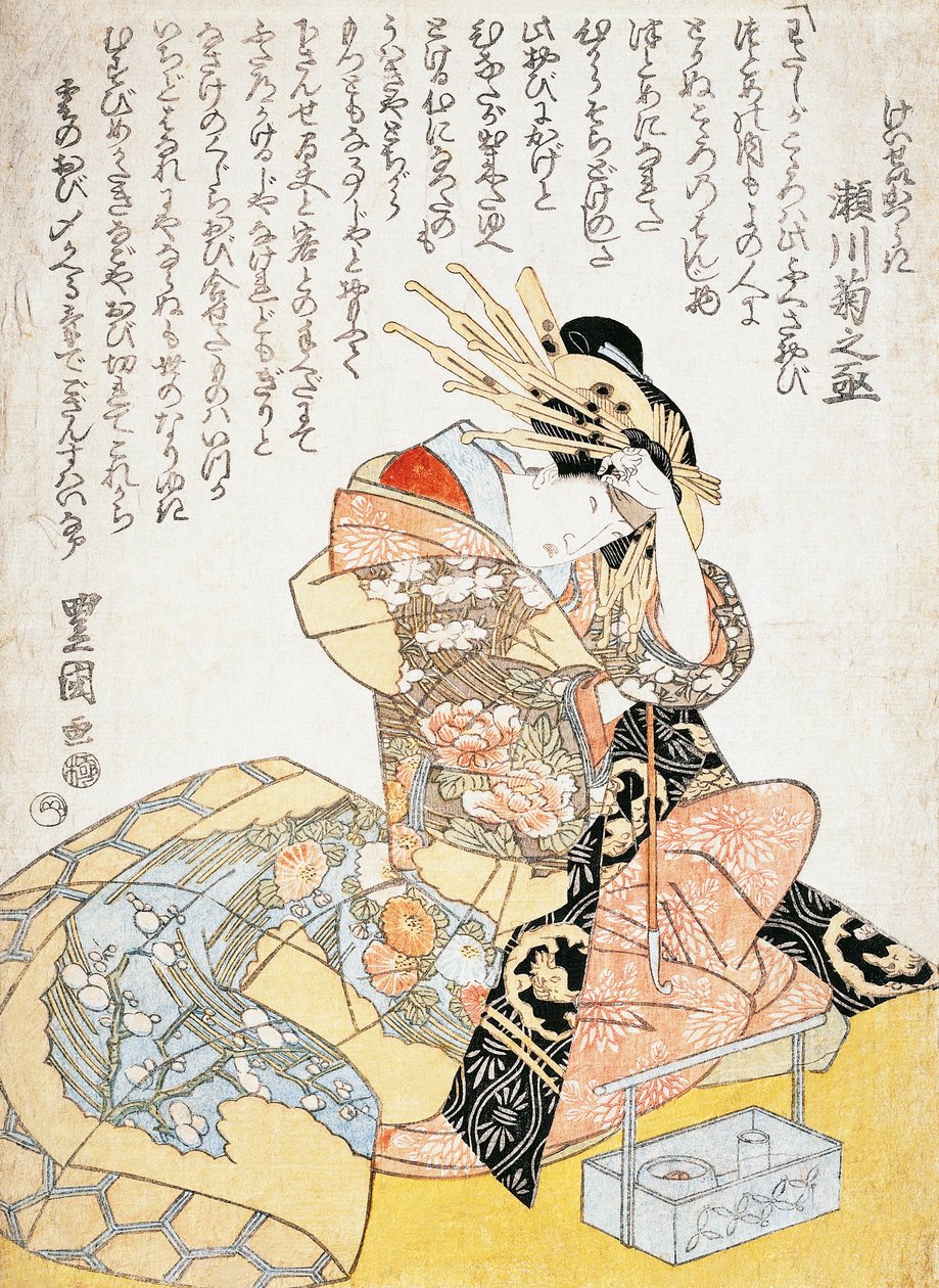 Woman with a Calligraphy Brush by Utagawa Toyokuni