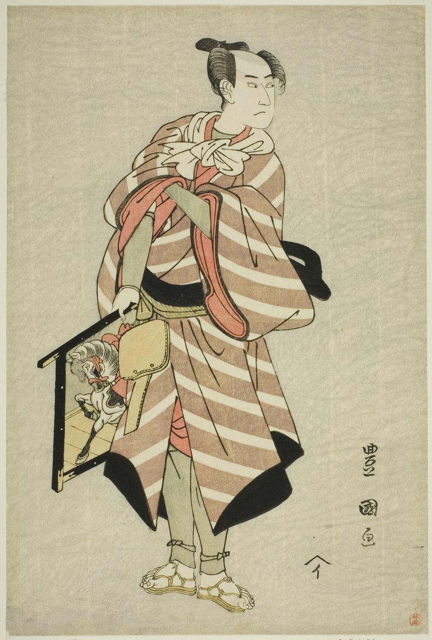 The actor Sawamura Sojuro III as the packhorse-man Muchizo in the play "Miyamairi Musubi no Kamigaki," performed at the Kiri Theater in the eleventh month, 1797 by Utagawa Toyokuni I