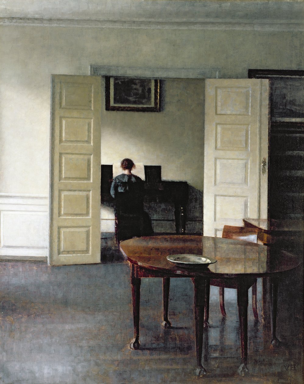 An Interior with a Woman Playing Piano by Vilhelm Hammershoi