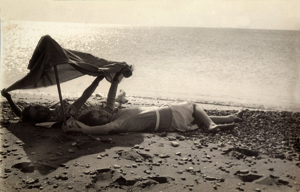 Two Women Lying on the Sea Shore in the Shade of a Towel. Postcard Sent by the Photographer to Vincenzo Balocchi by Vincenzo Balocchi