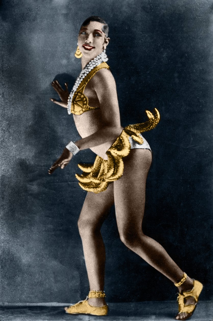 Josephine Baker (1906-1975) in 1925 in the Revue Negre at the Theatre des Champs-Elysees (Champs Elysees), with her banana belt. Photograph by Lucien Walery (1863-1935). by Walery