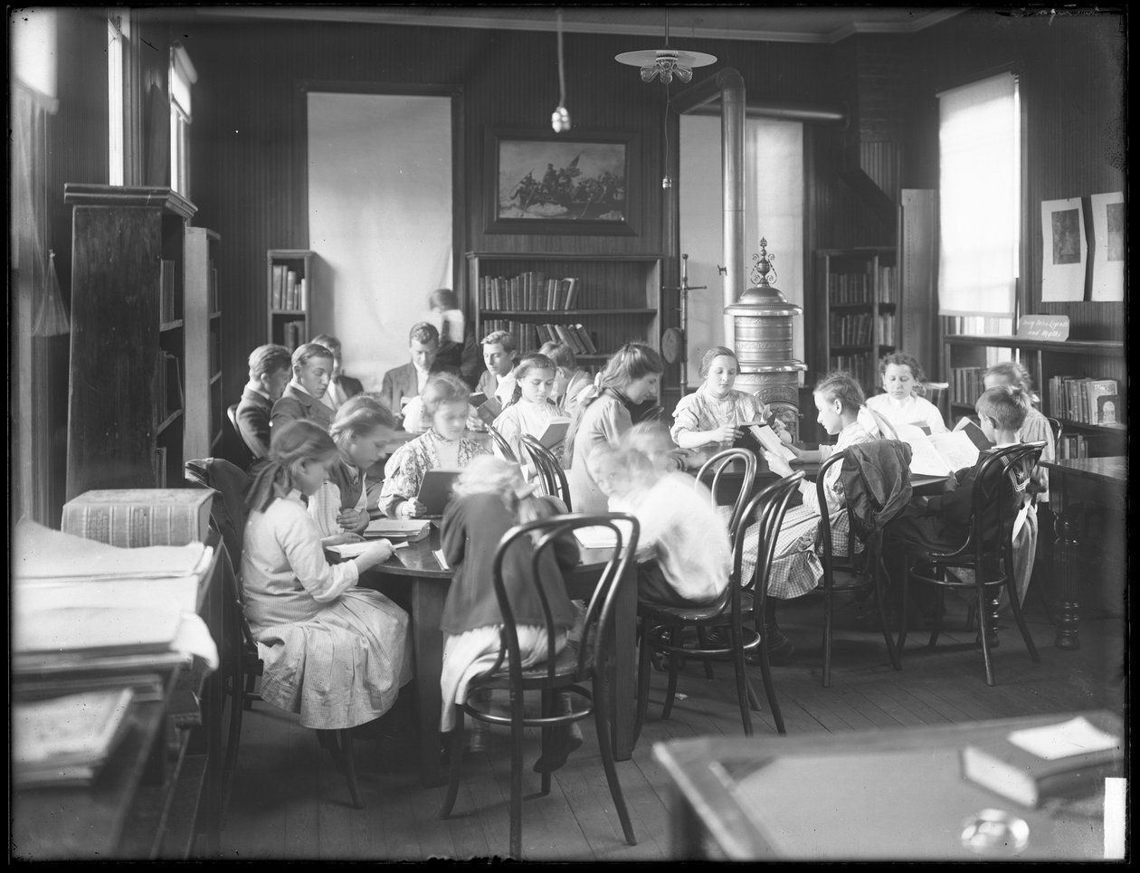 Children Reading in the Reading Room of an Unidentified Branch of the Queens Borough Public Library, c.1910 by William Davis Hassler