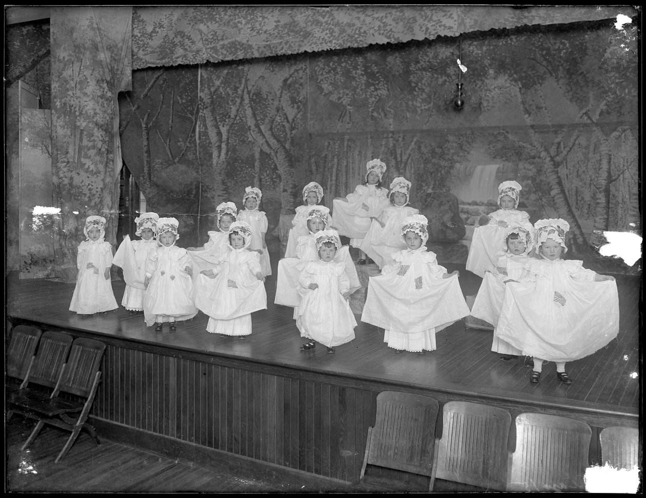 Kindergarteners on Stage: Very Small Girls Perform on a Small Stage, Probably the Roman Catholic Orphan Asylum, Kingsbridge, Bronx by William Davis Hassler