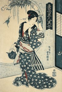 Young woman holding a teapot