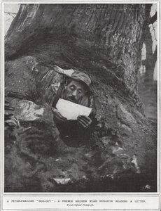 A Peter-Pan-like "dug-out", a French soldier near Monastir reading a letter by (after) English photographer