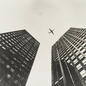 Plane Flying Across Two Towers by F. Abderrahim