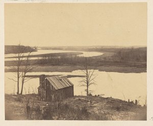 House on Shore of River by A.J. Russell