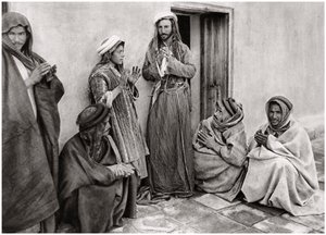 A Mullah Teaching a Prayer to a Young Man, Iraq, 1925 by A. Kerim