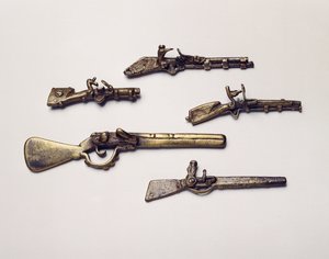 Gold weights cast in the form of guns by Akan School