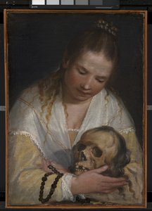 A Young Woman Contemplating a Skull