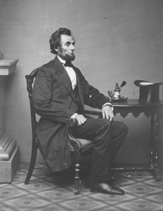 Abraham Lincoln, full-length portrait, seated by Alexander Gardner