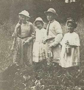 Untitled Flora, Elizabeth, Howard & Kitty in Lake George Field by Alfred Stieglitz