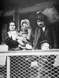 A migrant Italian family on the ferry from Ellis Island to New York City