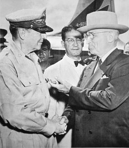President Harry S. Truman meeting General Douglas MacArthur on Wake Island during the Korean War, October 1950 by American Photographer