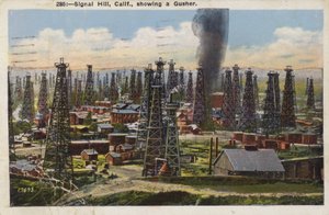 Signal Hill, California, showing a Gusher by American Photographer