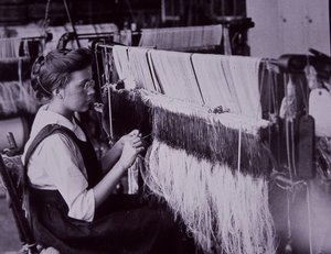 US Textile Industry, Textile Operator in Massachusetts Cotton Mill, c.1900 by American Photographer