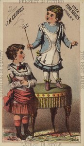 Girl Standing on Foot Stool
