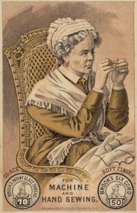 Woman Threading a Sewing Needle
