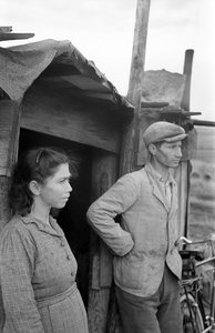 Crotone - Couple on the Door of the House by Ando Gilardi