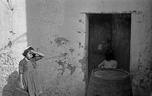 Little Girl with a Folding Box in School