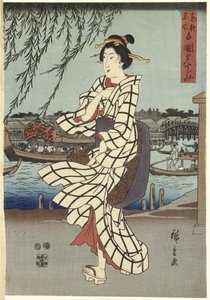 Woman Walking on a Riverbank