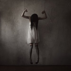 Haunting Puppet Girl