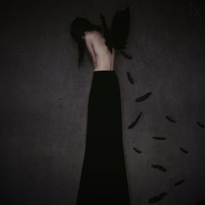 Sorrowful Winged Woman