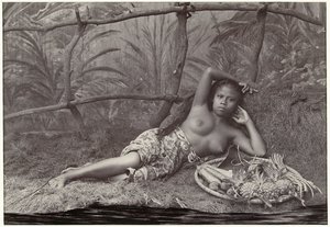 Portrait of an Unknown Half-Naked Indonesian Woman, Lying with a Fruit Basket in a Decor by Anonymous