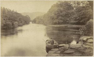 River Landscape in England, with a Man in a Rowboat in the Foreground
