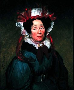 Portrait of a lady with a red and white bonnet by Augustine Cochet St. Omer