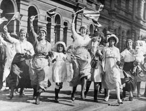 A Group of Women and Children Rejoicing in a Street in Sydney at the Signing of the Armistice, 11 November 1918