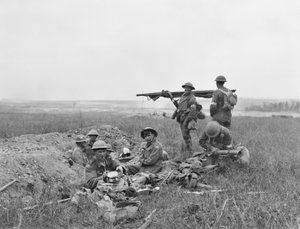 A scene during the battle of Hamel, showing American and Australian stretcher bearers working together in the front line area, after the infantry had passed, 4 July 1918
