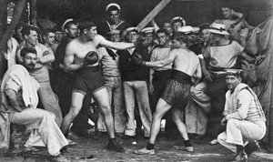 Unidentified sailors watch a boxing match in their midst aboard HMAS Melbourne, 1915