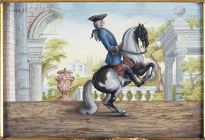 A skewbald horse of the Spanish Riding School performing the Pesade