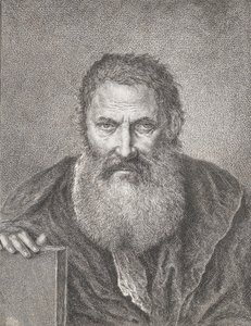 Portrait of a bearded man holding a book