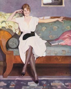 Woman with a Cat Sitting on a Sofa