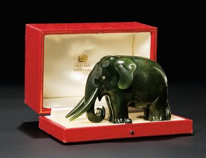 A jewelled nephrite model of an elephant, with diamond-set eyes, c.1900