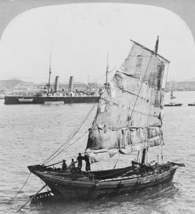 Chinese Junk and British Battleship in the Harbour at Hong Kong, 1902