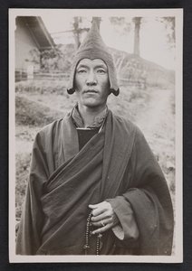 A Nyingma Monk Holding a Rosary