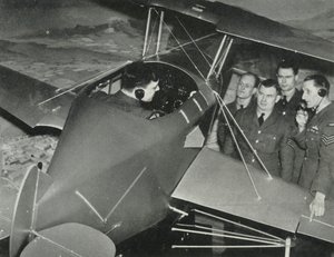 RAF personnel learning to fly in a flight simulator during the Second World War