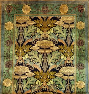 A Donegal Wool Carpet with a Flower Design by Charles Francis Annesley Voysey