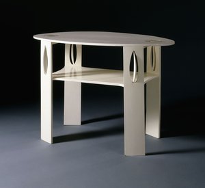 A white oval side table, originally designed for 14 Kingsborough Gardens, Glasgow
