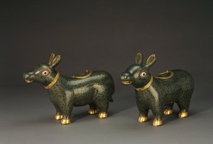 A pair of cloisonne enamel tapir form vessels