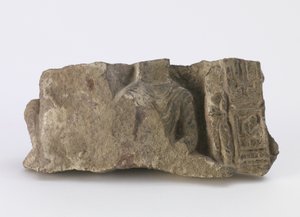 Fragment Showing Torso of Seated Buddha, a Standing Bodhisattva and Two Cartouches on the Front