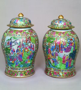Pair of Canton famille rose baluster vases and domed covers, early 19th century by Chinese School