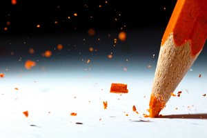 Orange Pencil Breaking by Christophe Kiciak